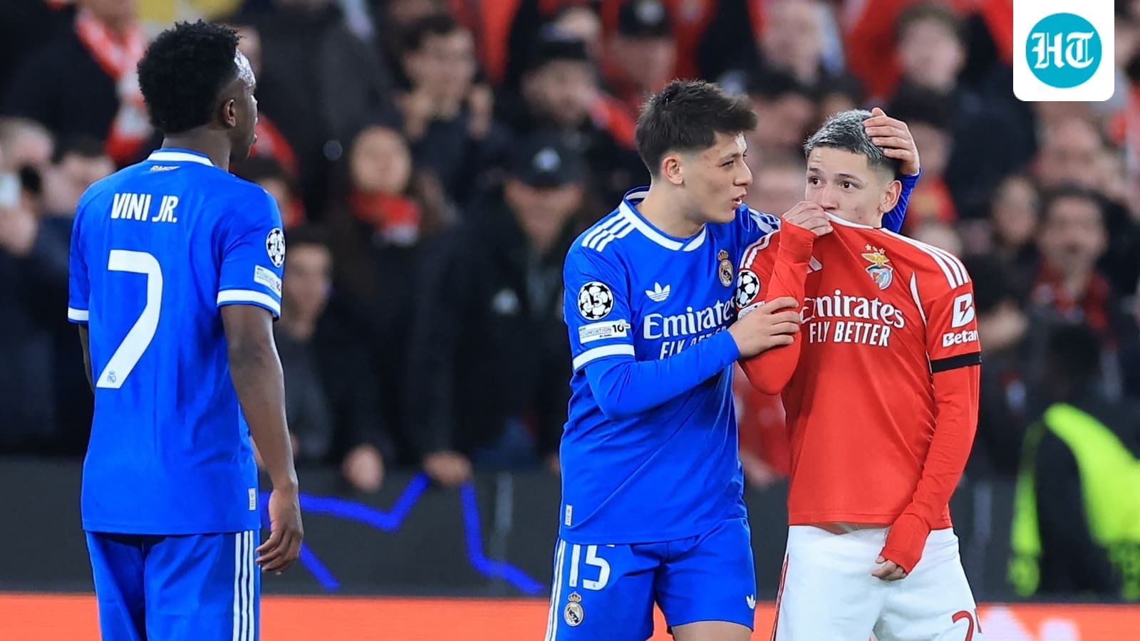 Vinicius reports racial abuse during Madrid's 1-0 win vs Benfica, forcing referee to halt play amid on-field tensions